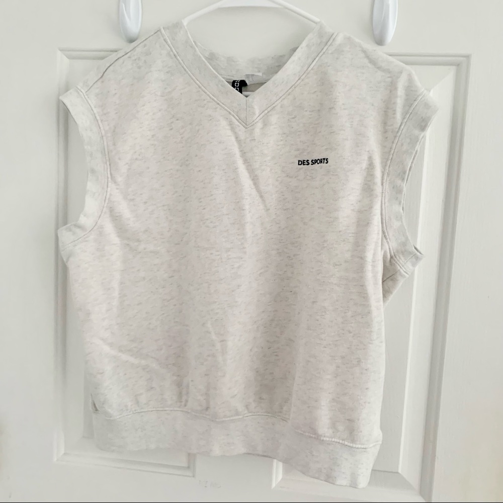 White grayish vest